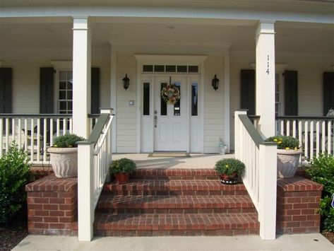 Brick steps leading to a protruding entry.  Very nice. Brick Steps With Railing, Exterior Front Entrance Ideas, Brick Front Steps, Brick Stairs, Front Porch Stairs, Front Entrance Ideas, Brick Porch, Wood Walkway, Porch Stairs