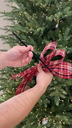 Ribbon Ornaments Christmas Tree, Bowdabra Christmas Tree Bows, Making Ribbons For Christmas Tree, Diy Ribbon Decor, Different Ways To Put Ribbon On Christmas Tree, Ribbon Christmas Ornaments Diy, Diy Christmas Tree Ribbon Garland, Easy Bows For Christmas Tree, How To Add Ribbon To Your Christmas Tree Video