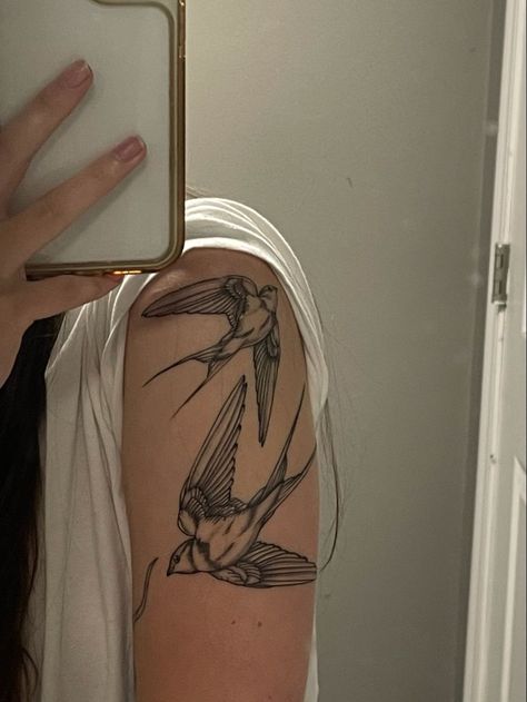 Black Swallow Tattoo, Bicep Bird Tattoo Women, Arm Tattoos For Women Birds, Tattoo Ideas Female Masculine, Bird Tattoo Swallow, Black And White Arm Tattoos For Women, Humming Bird Tattoo With Flowers Sleeve, Swallow Bird Tattoo Design, Swallow Bird Tattoo Fine Line