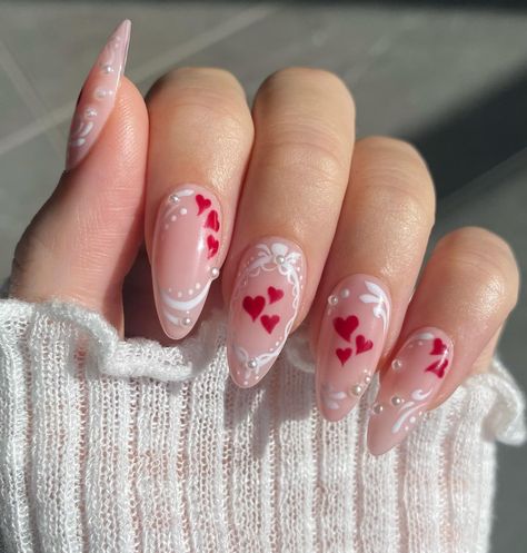 Heart nails ♥️♥️ IB: @jayseenails —— #nailart #nails #nailinspo #heartnails #naildesign Lace Valentines Nails, Heart Cutout Nails, Valentine Heart Nails, Cupid Nails Designs, Heart Design Nail Art, Pink Nails With Heart Design, Nail Designs With Hearts, Valentine S Day Nail, Almond Nails Valentines