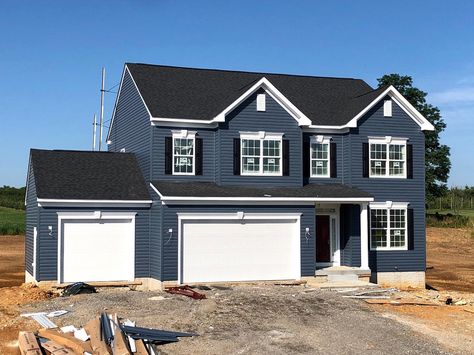 Blue Black And White House Exterior, Dark Blue Outside House Paint, Blue House Shutters Colors, Dark Blue Gray House Exterior, Black Roof Siding Colors, Deep Navy Exterior House, Blue House Roof Color, Dark Gray House With Black Shutters, Dark Blue Vinyl Siding House