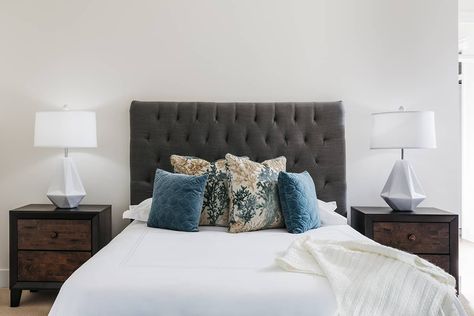 What Color Bedding Goes with A Gray Headboard? - Homenish Bedroom With Dark Grey Headboard, Bedroom With Dark Gray Headboard, Charcoal Headboard Bedroom Ideas, Grey Headboard Bedding Ideas, Gray Fabric Headboard Bedroom, Charcoal Grey Headboard Bedroom Ideas, Grey Fabric Headboard Bedroom, Dark Gray Headboard Bedroom Decor, Dark Gray Bedding Ideas