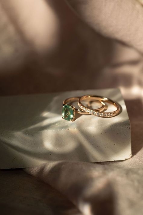 Elevate your style with this exquisite green gemstone ring. The square-cut emerald captures the essence of sophistication, while the gold band adds a touch of luxury. Perfect for special occasions or as an engagement ring. Save this pin for your dream jewelry collection! 💚 #GreenGemstone #LuxuryJewelry #EngagementRingInspo #ElegantAccessories Jewelry Set Photography Ideas, Jelewery Photoshoot, Moody Jewellery Photography, Engagement Ring Product Photography, Crystals And Gemstones Photography, Macro Jewelry Photography, Product Photography Rings, Jwelery Photography Idea, Moody Jewelry Photography