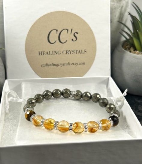 Attract Money Bracelet, Abundance Bracelet, Genuine Citrine , Pyrite & Tiger Eye Gemstone Bracelet, Wealth Abundance Prosperity Bracelet by CCsHealingCrystals on Etsy Abundance Bracelet, Money Bracelet, Prosperity Bracelet, Wealth Abundance, Tiger Eye Gemstone, Tigers Eye Gemstone, Attract Money, Gemstone Bracelet, Tiger Eye