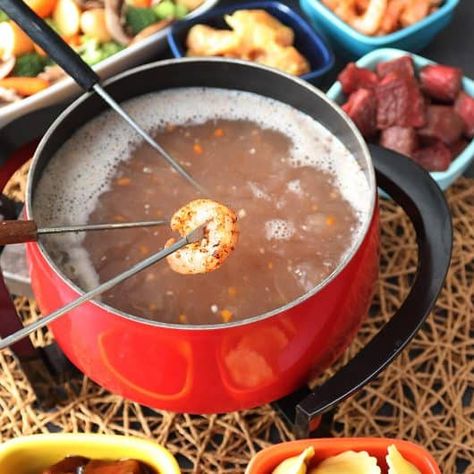 Melting Pot's Coq au Vin Fondue Copycat Recipe - Simply Happenings Melting Pot Coq Au Vin, Coq Au Vin Recipe Fondue, Melting Pot Mojo Broth Recipe, Coq Au Vin Fondue The Melting Pot, Wine Fondue Recipes, Fondue Oil Recipes Meat, Broth Fondue Dippers Ideas, Appetizer Fondue Recipes, Fondue Broth Recipes Meat