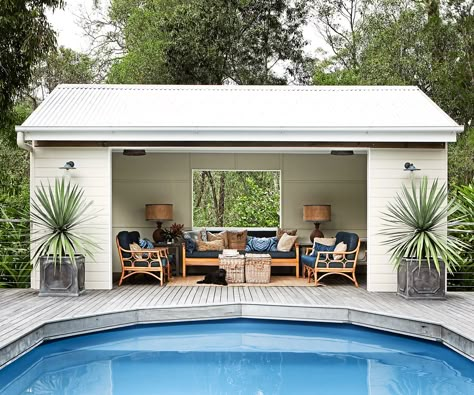 Outdoor rooms that get the balance right:“Many outdoor rooms are under-decorated. I love fabrics, layers and textures for these spaces,” says Brisbane decorator Angela Antelme of [Ascot Living](http://www.ascotliving.com.au/?utm_campaign=supplier|target="_blank"), whose own pool house shown here is furnished with comfortable lounge chairs, oodles of cushions and lamps, with a focus on natural fabrics and fibres. Pool Aesthetics, Timber Pavilion, Backyard Pool House, Pool House Shed, Pool Makeover, Kleiner Pool Design, Pools Design, Pool Gazebo, Pool House Ideas