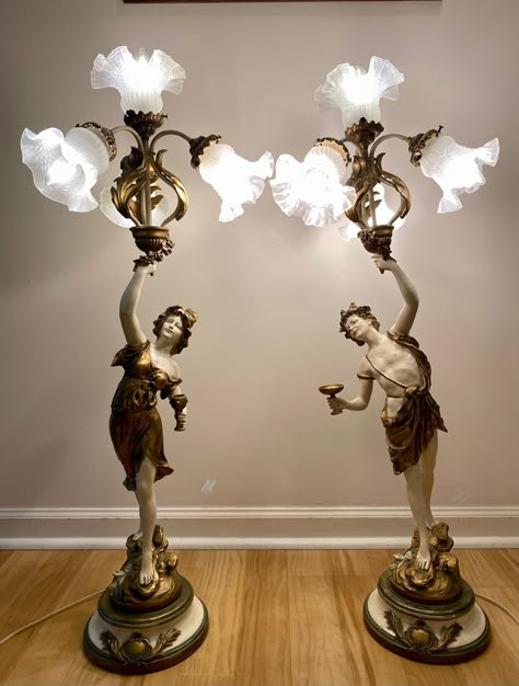 L. & F. Moreau Collection Francaise Spelter Art Nouveau Newel Post Figural Lamps Vintage Made in USA. 40"H  16"W. The base is 9". Each lamp is 16 lbs. Both lamps are in excellent working condition. Each one has 4 lights with frosted glass shades. All 8 shades are in excellent condition: no chips or cracks.  The top light holder on the "Boy" lamp has a small chip in result of which it is missing on of the 3 screws. The Boy lamp torch is not as straight as the other one. Please see the pictures an Art Nouveau Room, Lampe Art Nouveau, Antique Lamps Victorian, Gothic Lamp, Art Nouveau Statue, Art Nouveau Lamp, Art Nouveau Table, Art Nouveau Furniture Lamps, Victorian Bridge Lamp