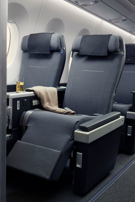 9 airlines with premium economy cabins worth splurging on | CN Traveller Premium Economy Seats, Airline Interiors, Newark Airport, Premium Economy, Economy Seats, Cathay Pacific, Aircraft Interiors, Airline Travel, Travel Clothes