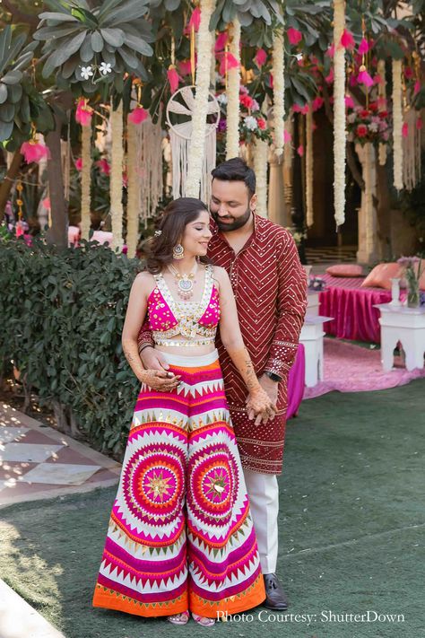 Nikita Vakadkar and Ashray Arora, Shahpura House, Jaipur | WeddingSutra Couple Mehendi Outfits, Mehandi Outfit Ideas For Bride, Couple Haldi Outfit Ideas, Sangit Outfit Ideas For Bride, Mehendi Night Outfit, Mehendi Bride Outfit, Bride Mehendi Outfit, Haldi Couple Outfits, Mehendi Outfit Ideas For Bride