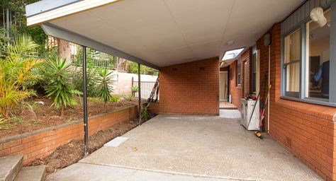 How to convert your carport into an outdoor oasis | Better Homes and Gardens Turning Carport Into Patio, Under Carport Ideas, Carport Converted To Patio, Turn Carport Into Patio, Carport Garden Ideas, Carport Transformation Living Spaces, Carport Lounge Ideas, Turn Carport Into Living Space, Carport Patio Makeover