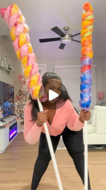 Waverly on Instagram: "Another #throwback of My giant #rainbow twist #lollipop #diy I did  last year for my #candylandchristmas ! #giantlollipop #giantcandy  #dollartreediy #candyland #giantprop #rainbowlollipop #artsandcrafts" Diy Christmas Candy Yard Decorations, Christmas Float Decorations, How To Make Giant Lollipops, Candyland Charcuterie Board, Gingerbread Land Decorations, Diy Yard Lollipops, Oversized Candy Props, Candyland Christmas Centerpieces Ideas, Christmas Diy Candy Decorations