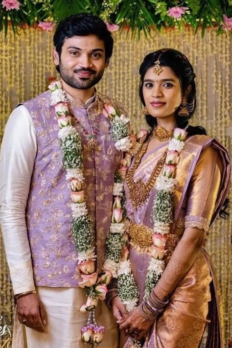 Presenting you latest wedding outfit inspiration for south indian couple. Check out the latest south indian wedding ideas at weddingbazaar.com #weddingbazaar#indianwedding #southindianbrides #silksarees #kanjeevaramsaree #southindiansareelook #southindiansareeblousedesign #southindiansareewhite #southindianweddingoutfitsisters #southindianweddingoutfitgroom #southindianweddingoutfitbridegroom #southindianweddingoutfitformen #southindianweddingoutfitguest #southindianweddingoutfitsaree South Indian Wedding Ideas, Engagement Couple Outfits Indian, South Indian Engagement Outfit, Unique Wedding Outfits, Engagement Outfits Indian Couple, South Indian Engagement, Indian Engagement Outfit, Engagement Couple Dress, Engagement Dress For Groom