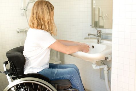 Creating a Wheelchair-Friendly Home: A Complete Guide Accessible Bathroom Sink, Wheelchair Accessible Bathroom, Accessible House Plans, Accessible House, Wall Mounted Bathroom Sinks, Walk In Tubs, Accessible Bathroom, Wheelchair Friendly, Wheel Chair