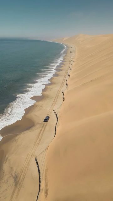 Global Travel Destinations ✈️ 🌴 ⛺️ 🗺️ on Instagram: "Your next destination - drive along the beach where the ocean meets the 📍 Namib Desert 🇳🇦 • 🧠 The place where the Atlantic Ocean meets the Namib Desert is known as the Skeleton Coast in Namibia. Stretching along the country’s northwest coast, this unique and remote coastal area is characterized by its vast dunes, shipwrecks, and a harsh desert landscape meeting the cold waters of the Atlantic. The name “Skeleton Coast” originates from the numerous shipwrecks scattered along the shore, contributing to its eerie and mysterious atmosphere. It’s a place of stark beauty and a haven for wildlife adapted to this challenging environment • 🎥 Credit: @joshstrauss_ • ✅ Tag us and Use hashtag #theglobedestination to get your Reel featured • # Skeleton Coast, Waves Wallpaper Iphone, Car Jeep, Namib Desert, Dji Drone, Waves Wallpaper, Northwest Coast, Travel Locations, Global Travel