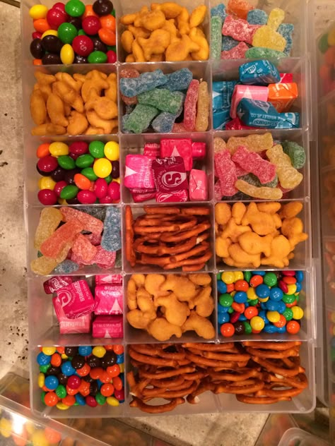 Snack box with goodies for road trip! Box, 1.99 from hobby lobby!! Travel Candy Ideas, Snack Box For Traveling, Road Trip Snacks To Make, Tackle Box Snack Boxes, Snack Box Travel, Snack Ideas From Store, Snacks For Side By Side Ride, Airplane Snackle Boxes, Snack Box For Car