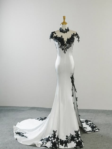 Demon Wedding Dress, Mom Traditional Wedding Dress, White Wedding Dresses With Black Lace, White Wedding Dress With Black Lace Overlay, Black And White Wedding Dress Mermaid, Batman Wedding Dress, White And Black Prom Dress, White Wedding Dress With Black Accents, Black Lace Wedding Dress With Sleeves