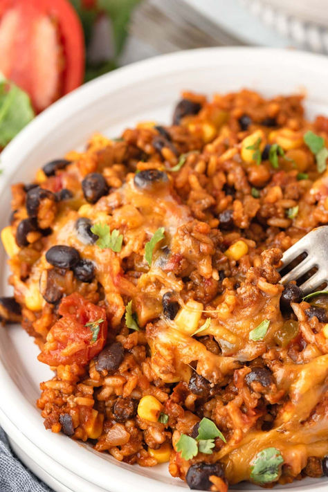 Sizzle up your dinner routine with this One-Pan Mexican Beef & Rice Skillet! Loaded with flavor, easy to make, and even easier to clean up. It's the perfect meal for a busy weeknight. Packed with savory beef, wholesome rice, black beans, and melty cheese, it's a family-pleasing feast. Get the full recipe at littlechefwithin.com and enjoy a fuss-free, fabulous dinner tonight! Cheesy Italian Rice Skillet, Weeknight Mexican Meals, Meals With Spanish Rice, Meals With Black Beans And Rice, Taco Rice Skillet Beef, Southwest Ground Beef Skillet, Healthy Black Beans And Rice, One Pot Mexican Beef And Rice Casserole, Cheesy Beef Black Bean And Rice Skillet