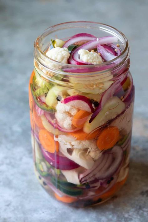 Quick Pickled Vegetables are an easy and healthy way to add a burst of flavor to any meal! This simple recipe can be used to pickle almost any fresh veggie. Try cauliflower, green beans, summer squash, daikon radish, carrots, onion, cucumber, peppers and asparagus. Pickled Vegetables Recipe Refrigerators, My Saved Recipes On Pinterest, Summer Pickles, Refrigerator Pickled Vegetables, Pickle Veggies, Pickled Veggies Recipe, Pickling Veggies, Gut Foods, Quick Pickled Vegetables