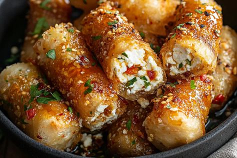 Oven Fried Feta Rolls with Chili Honey Baked Feta Bites, Honey Fried Feta, Salt Snacks For Party, Crunchy Chili Feta Chicken, Quick Salty Snack Recipes, Crispy Phyllo Wrapped Baked Feta With Honey, Feta Cheese Uses, Christmas Protein Appetizers, Vegetarian Appetizers Recipes