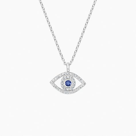 Evil Eye Sapphire and Diamond Pendant - Silver. An ancient symbol of protection, this delightfully chic pendant sparkles diamonds in the form of an evil eye with a sapphire in the center. Stylish and symbolic, this design is perfect on its own or easily matched with other necklaces (1/8 total carat weight). Sapphire Pendant Necklace, Symbol Of Protection, Sapphire Necklace Pendants, Sapphire Pendant, Brilliant Earth, Sapphire Necklace, Pendant Silver, Sparkle Diamonds, Diamond Earrings Studs