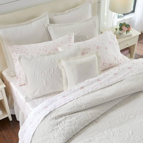 The Laura Ashley Rowland duvet set highlights an elegant and classic textured floral matelassé design. The reverse fabric is smooth white cotton. Standard and king shams have European end cap closures. Made of 70% poly/30% cotton in a raised floral texture, the reverse is 100% cotton. Set contains one duvet cover and two standard or king shams (one sham for twin size). Duvet cover includes corner ties to keep your insert in place. Machine washable for easy care. White Comforter Bedroom, White Comforter, Floral Texture, White Duvet Covers, White Duvet, Comfortable Bedroom, Room Redo, Room Makeover Bedroom, Chic Bedroom