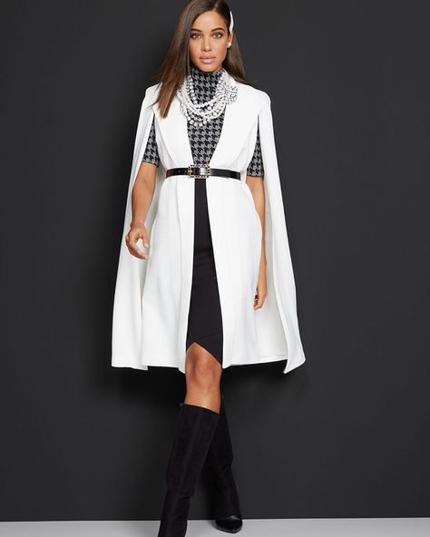 Dramatic entrance with this statement cape. #nyandcompany Belted Cape Coat, Belted Cape, Dramatic Entrance, Cape Fashion, Chic Jacket, Cape Jacket, Cyberpunk Fashion, Company Website, Black And White Tops