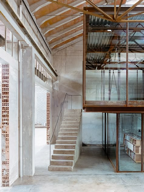 AMAA architecture studio created inside converted factory in Italy Architecture Renovation, Concrete Staircase, Abandoned Factory, Basement Floor Plans, Glass Structure, Old Factory, Adaptive Reuse, Office Set, Architecture Office