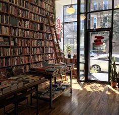 autumn Bookshop Café, Lots Of Books, Singer Dr, Controlled Chaos, Book Shops, Brown Cafe, Bookstore Cafe, Town Ideas, Dream Library