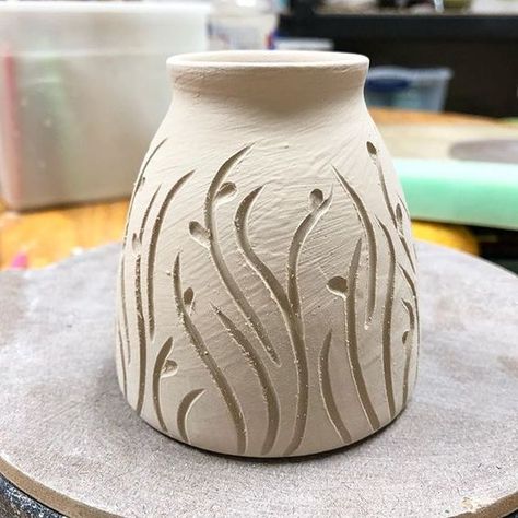 This little pot is only about 3 inches tall and asked for a simple design. It’s winter outside but I’m dreaming of spring already so little buds came to mind. Now to clean up the lines, and get it dried and fired. #pottery #wheelthrown #carvedpottery #budvase #ceramics #handmadepottery Clay Carving Designs, Winter Outside, Pottery Supplies, Ceramic Texture, Sculptures Céramiques, Pottery Handbuilding, Tanah Liat, Hand Built Pottery, Clay Vase