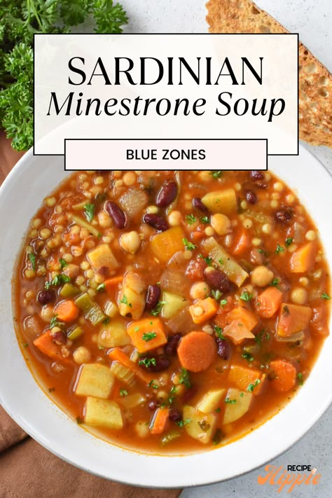 Sardinian minestrone soup gained popularity through the captivating Netflix documentary ‘Blue Zones’. This soup features a large variety of hearty and nutritious seasonal vegetables, beans, and spices, making it delicious and super healthy. It’s incredibly versatile, and in this specific Sardinian minestrone recipe, we save time and effort by using canned beans! If you're looking for healthy soup recipes, this is the best one! 3 Bean Minestrone Blue Zone, Blue Zones Sardinian Minestrone, Mediterranean Minestrone Soup Recipe, Three Bean Minestrone Soup Blue Zone, Blue Zone Bean Soup, Minestrone Soup Blue Zone, Sardinian Longevity Minestrone, Pasta House Minestrone Soup Recipe, Minestrone Soup Recipe Authentic