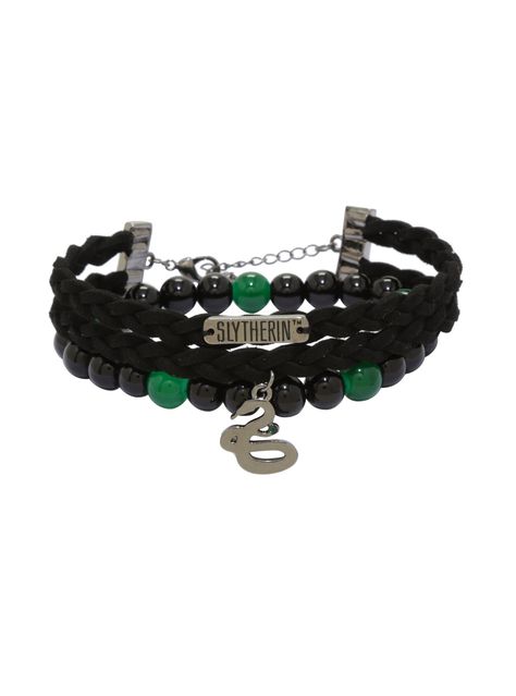 <div>A suede cord and bead <i>Harry Potter</i> bracelet ssssssset is pure Slytherin. The adjustable braided and beaded accessories include a snake charm to reflect your house crest and green beadssss on a stretchy bracelet.</div><div><ul><li style="list-style-position: inside !important; list-style-type: disc !important">Charms: Alloy</li><li style="list-style-position: inside !important; list-style-typ... Slithering Outfits, Diy Slytherin, Slytherin Bracelet, Slytherin Accessories, Slytherin Jewelry, Slytherin Student, Harry Potter Script, Jewelry For Guys, Harry Potter Bracelet