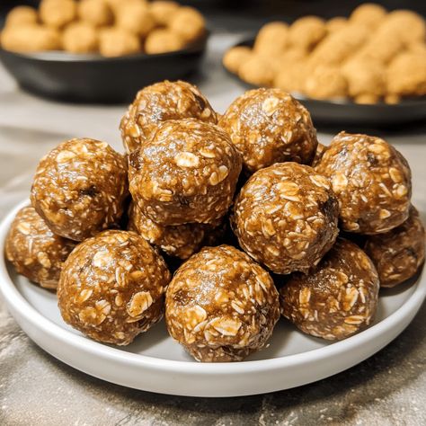 Peanut Butter Energy Balls are delicious, no-bake snacks made with oats, peanut butter, and honey for a quick energy boost. Vegan Peanut Butter Energy Balls, Oats Peanut Butter Honey, Peanut Butter Oat Balls, Peanut Butter Energy Balls Recipe, Coconut Energy Balls, Bake Snacks, Oats Peanut Butter, Protein Balls Healthy, Peanut Butter And Honey