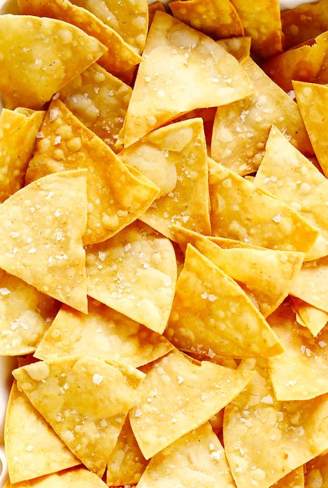 This homemade tortilla chips recipe is easy to make with 3 basic ingredients (corn tortillas, oil and salt) and always SO delicious! | gimmesomeoven.com #homemade #corn #tortilla #chips #glutenfree #vegan #vegetarian #appetizer #gameday #snack Chips From Corn Tortillas, Corn Chips Recipe, Tortilla Chip Recipe, Homemade Tortilla, How To Make Tortillas, Mexican Side Dishes, Homemade Corn Tortillas, Homemade Tortilla Chips, Homemade Chips