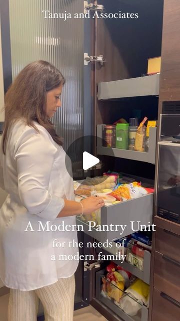 Tanuja and Associates on Instagram: "⚖️A well-designed pantry is essential for a functional and organized kitchen. 

Modern pantry units, with features like pullout drawer racks and stacked racks attached to the door (as shown here), make it easy to access and organize your items. 

👇Here are some things to keep in mind while designing modern pantries, to make sure all your groceries and kitchen essentials are safe, accessible, and organized. 

1️⃣ Design for Accessibility: Incorporating modular designs (pullout drawers, rotating racks etc.) to ensure every item is within easy reach, reducing the need to dig through shelves.

2️⃣ Material Selection: We opted for profile shutters with fluted glass for a contemporary look and veneer finishes for a touch of warmth. These materials are not on Pantry Units In Kitchen, Pantry Unit Kitchen Modern, Profile Shutter Kitchen, Glass Profile Shutter Kitchen, Modern Pantries, Pullout Pantry Organization, Pantry Unit Design, Reach In Pantry Design, Pantry Unit Kitchen