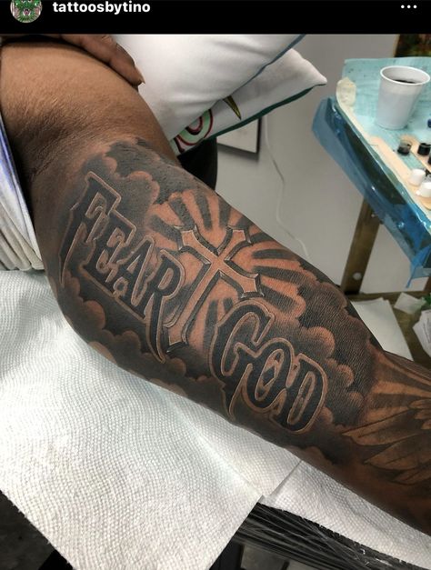 Good Half Sleeve Tattoos For Men, Inner Bicep Tattoo Men Black, Modern Tattoos Men Arm, Are Sleeve Tattoo, Houston Chest Tattoo, Tattoo For Upper Arm, Bicep Tattoo For Guys Inner Words, Forearm Tattoos Words Lettering, Fear God Bicep Tattoo