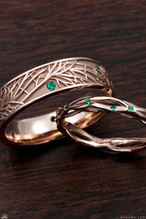 Our classic Tree of Life Wedding Band is enhanced with flush set emeralds set within the branches. The complimentary Tree Branch Diamond Wedding Band features matching emeralds. Classic Wedding Band Sets, Unisex Wedding Bands, Nature Themed Rings, Make Wedding Bands, Sapphic Wedding Rings, Elf Wedding Ring, Pagan Wedding Rings, Matching Rings For Couples Wedding Bands, Wedding Bands His And Hers Unique