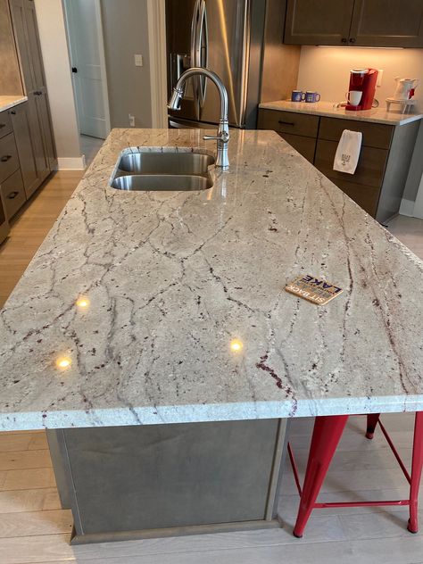 River white granite River White Granite Countertops, River White Granite, Lake Kitchen, White Granite, Kitchen Countertops, Kitchen Ideas, Basement, Countertops, Dining Table