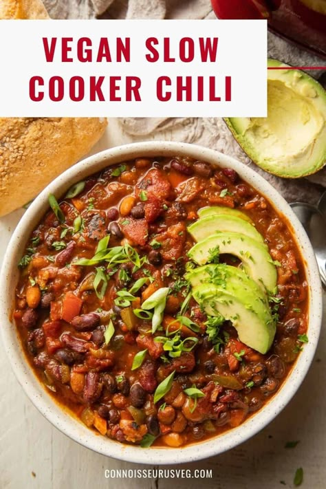 This vegetarian slow cooker chili delicious, hearty and super easy to make! Super satisfying and perfect for busy weeknights. Chilli Recipe Slow Cooker, Vegetarian Chili Recipe Crockpot, Chilli Recipe Crockpot, Vegan Chili Crockpot, Slow Cooker Vegan Chili, Vegetarian Chili Crock Pot, Slow Cooker Chilli, Slow Cooker Vegan, Slow Cooker Vegetarian Chili