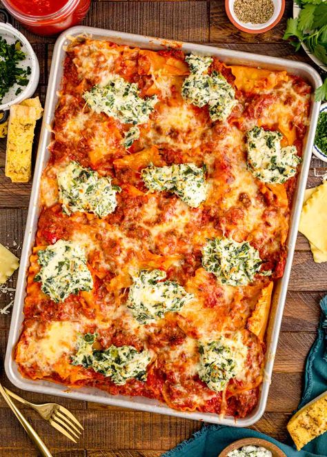 Giada's All-Crust Sheet Pan Lasagna is a simple yet delicious make-and-dump lasagna recipe that skips the tedious layering process! This sheet pan meal will feed a large crowd while easily pleasing their taste buds! Pan Lasagna Recipe, Sheet Pan Lasagna, Pan Lasagna, Layered Pasta, Giada Recipes, Sheet Pan Dinners Recipes, Homemade Lasagna, Mild Italian Sausage, Color Sheets