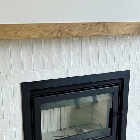 Interiors on Instagram: "TILES ARE NOT ONLY FOR SHOWERS - The use of textured subway tiles around this fireplace worked so well- just adding some texture to the wall - thank you to @utilesolutions for the layout so perfectly done at this new build - #tiling #fireplacedetails#interiors#decor#juliainginteriors" Fireplace Zellige Tile, Textured Tile Fireplace, Herringbone Tile Pattern Fireplace, Subway Tile On Fireplace, Zellige Tile Fireplace, Tile Fireplace Ideas, Black Herringbone Tile Fireplace Surround, Zeolite Tile Fireplace, Fireplace Tile Ideas