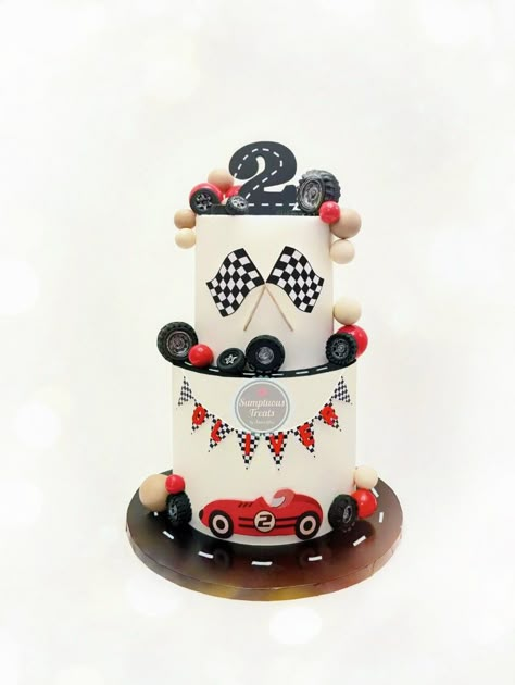 Racing Theme Cake #racing #racingcar  #cartheme #carthemecake #2ndbirthday #kidsbirthday #customcakes #sumptuoustreats #torontocakedecorator #cakes #torontocakes   www.sumptuoustreats.com Race Cars Birthday Cake, Too Fast Cake Ideas, Racing Car Theme Cake, Fast 1 Birthday Cake, First Lap Birthday Cake, Steering Wheel Cake, Racing Car Cake For Boys, Race Theme Cake, Race Birthday Cake