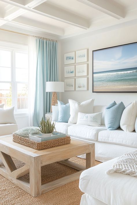 Transform your home with this serene coastal living room decor. Featuring soft blues and natural textures, it brings the calm of the seaside into your space. Perfect for achieving a tranquil and stylish look. #livingroomdecor #coastalstyle #homedecor 🌊 Sophisticated Coastal Living Room, Blue And White Living Room Apartment, Coastal Living Room Area Rugs, Living Room Coastal Farmhouse, Coastal Themed Living Room, Classy Beach Decor, Nautical Home Decor Coastal Style, Colorful Beach House Interior, Coastal Design Living Room