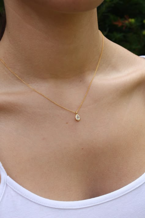 Tiny Drop Minimalist Necklace, Dainty Crystal Quartz Teardrop Pendant, Layering Everyday Jewelry, April's Birthstone, Gift for her, Silver This dainty and delicate layering necklace features a tiny clear crystal quartz teardrop bezel framed in your choice of gold filled or sterling silver. The petite pendant is suspended from a dainty chain in the finish of your choice. ...#Minimalist #of #Elegance #Jewelry #Jewelry #Embracing #Organizers #Art #Beauty #The #and #of #the #Exploring #Simplicity Everyday Gold Necklace Minimalist Jewelry, Small Dainty Necklaces, Pretty Dainty Necklaces, Dainty Jewelry Silver Necklace, Simple Formal Jewelry, Simple Beautiful Necklaces, Dainty Bridesmaid Jewelry, Simple Dainty Necklace, Minimalist Gold Pendant