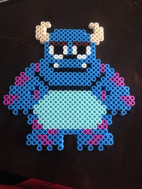 Sully from Monsters Inc. perler bead Sully Perler Bead Patterns, Sully Perler Beads, Sullivan King Perler, Disney Perler Bead Patterns, Sully From Monsters Inc, Buu Monster Inc, Easy Perler Beads, Perler Bead Projects, Pearl Beads Pattern