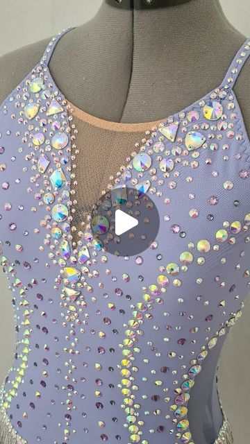 Sara Wahlberg|Costume design on Instagram: "Ready for some magic? 😉🪄🪄  #wahlbergcreations  #batontwirlingcostume #batontwirling #twirlingbaton #twirling #leotard #lavender #bling #rhinestones #strass #beaded #custommade #costumedesigner" Leotard Stoning Ideas, Rhinestone Leotard, Baton Twirling Costumes, Rhinestone Ideas, Crystal Ideas, Twirling Costumes, Aerial Costume, Baton Twirling, Rhinestone Costumes