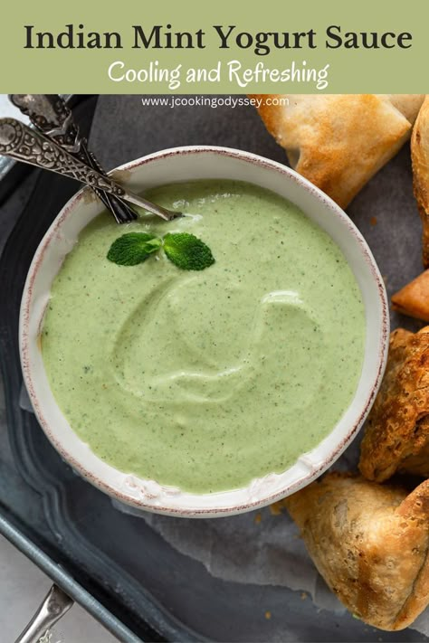 Indian mint yogurt chutney in a bowl with spoon Indian Yogurt Sauce, Indian Mint Sauce, Mint Raita Recipe, Mint Yogurt Sauce, Indian Sauces, Tandoori Paneer, Onion Bhaji, Cilantro Chutney, Mint Yogurt