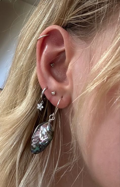 Earring Styling Silver, Ear Piercings Vintage, Silver Earring Stack Prom, Earrings Stack Aesthetic, Ear Style Silver, Ear Styling Ideas Silver, Three Lobe Piercings Silver, Multiple Ear Piercings Aesthetic Silver, Ear Piercings Sliver