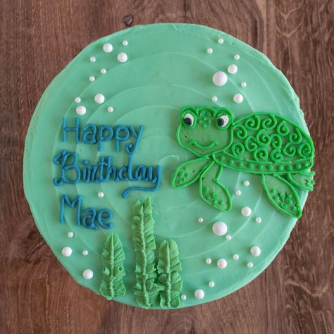 This gluten-free birthday cake is decorated with a sweet little sea turtle swimming around in an ocean of edible pearl bubbles. Turtle Decorated Cake, Salmon Birthday Cake, Turtle Themed Cake, Sea Turtle Themed Birthday Party, Turtle Cake Design, Sea Turtle Birthday Cake, Turtle Cake Ideas, Turtle Themed Birthday Party, Turtle Birthday Theme