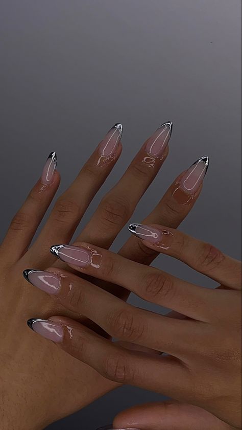 Black Chrome Nails Designs French, Almond Nails Silver Design, Black Silver French Tip Nails, Silver Glazed Nails, French Nails Metallic, Grey New Years Nails, January Chrome Nails, Nude And Silver Nail Designs, Black And Silver Almond Nails