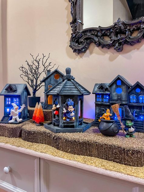 I’m not sure if you’ve seen the Disney Halloween Village from Costco that has gone viral on social media. I have looked high and low for the Disney Village at our local Costco, but I haven’t had any success. I... Read More The post How to Make Your Own Halloween Village first appeared on Helen G. Bailey. The post How to Make Your Own Halloween Village appeared first on Helen G. Bailey. Disney Halloween Village Display, Diy Halloween Village Display, Disney Halloween Village, Halloween Village Display Ideas Diy, Diy Disney Halloween Decor, Diy Halloween Village Houses, Halloween Village Display Ideas, Halloween Village Diy, Halloween Fairies